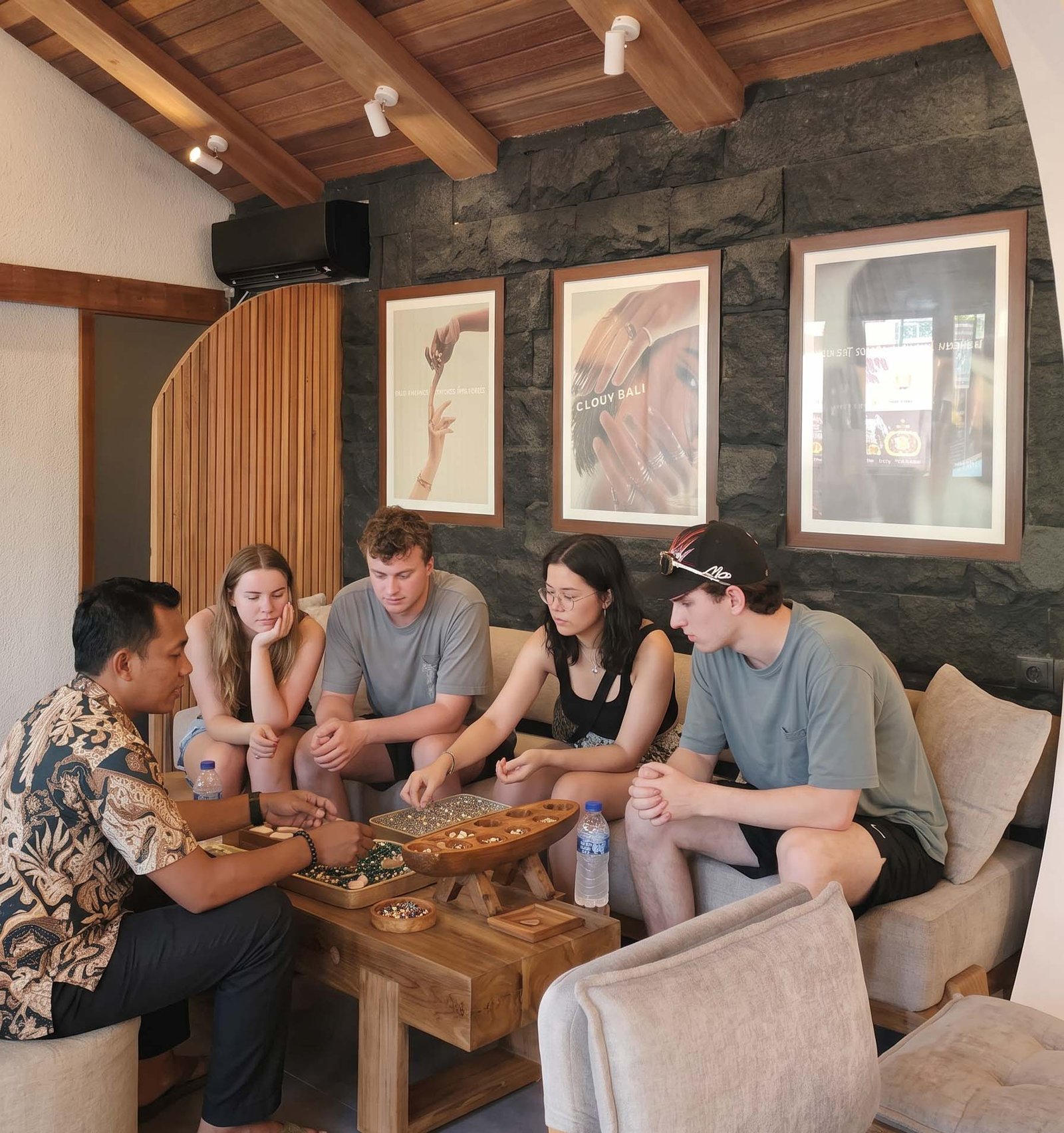 Guests talking with an instructor in the Meru studio lounge