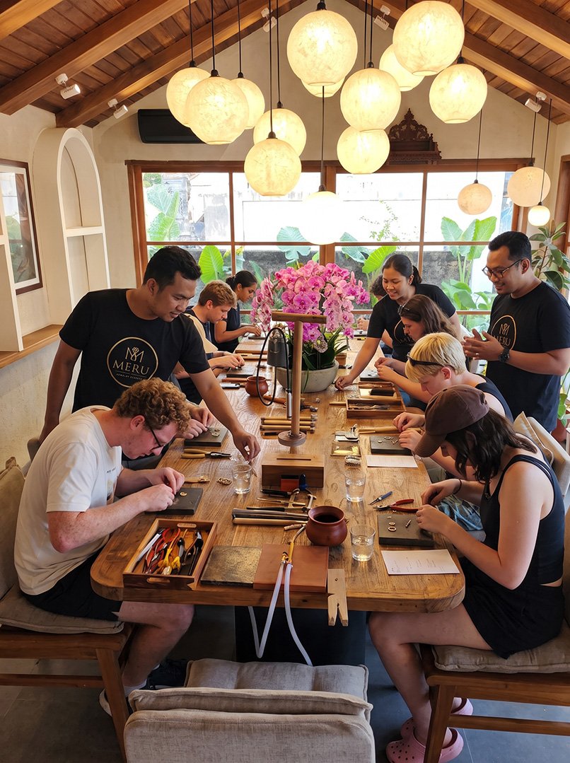 Guests making jewelry with instructors at Meru Jewelry Classes in Canggu